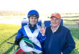 Stephen Jones, right, with top country jockey Aaron Bullock. Picture Scone Race Club