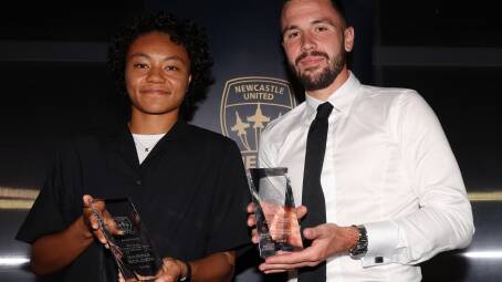 Sarina Bolden and Apostolos Stamatelopoulos with their play of the year awards at the Jets'presentation night at Modus Merewether. Picture by Peter Lorimer.