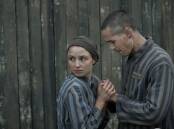 Anna Prchniak as Gita Fuhrmannova and Jonah Hauer-King as Lale Sokolov in The Tattooist of Auschwitz. Picture Stan
